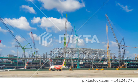Commercial Airplane Parking Near Terminal 3 Of Tan Son Nhat International Airport Under Construction, Vietnam. Commercial Airplane Parking Near Terminal 3 Of Tan Son Nhat International Airport Under Construction, Vietnam. 141245773
