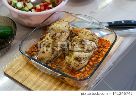 Deliciously Roasted Chicken Breasts Served on a Bed of Flavorful Vegetables, Perfect for a Family Dinner or a Special Occasion Deliciously Roasted Chicken Breasts Served on a Bed of Flavorful Vegetables, Perfect for a Family Dinner or a Special Occasion 141246742