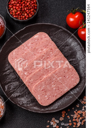 Canned spiced ham slices for holiday sandwiches. Ham slices Canned spiced ham slices for holiday sandwiches. Ham slices 141247564