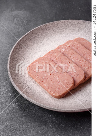 Canned spiced ham slices for holiday sandwiches. Ham slices Canned spiced ham slices for holiday sandwiches. Ham slices 141247582