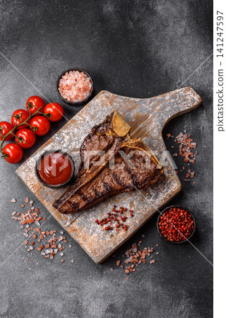 T-bone steak, beef meat grilled until done rare with salt and spices. T-bone steak T-bone steak, beef meat grilled until done rare with salt and spices. T-bone steak 141247597