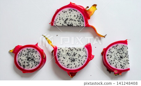 Dragon fruit slices on white background Dragon fruit slices on white background 141248408