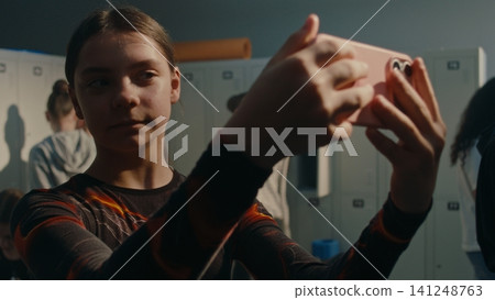 Two Gymnasts Taking Selfie in Locker Room Before Practice Two Gymnasts Taking Selfie in Locker Room Before Practice 141248763