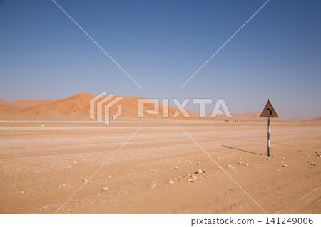 Road sign on desert track in the Rub al Khali, Empty Quarter, Oman Road sign on desert track in the Rub al Khali, Empty Quarter, Oman 141249006