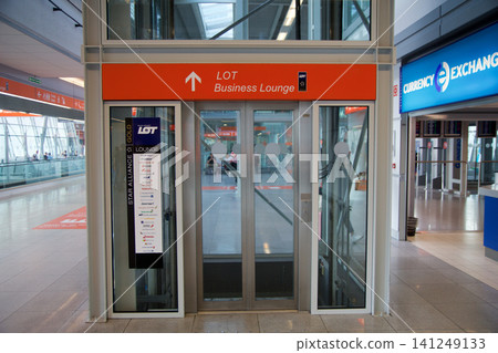 Warsaw, Poland, May 10 2018: Elevator access to business lounge in airport terminal Warsaw, Poland, May 10 2018: Elevator access to business lounge in airport terminal 141249133