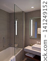 Wroclaw, Poland, June 15, 2018: Bathtub and shower with glass splash guard in luxury hotel bathroom 141249152