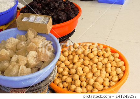 Himalayan rock salt and walnuts lined up in souvenir shops in Pokhara, Nepal. 141249252