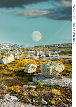 Rugged Hardangervidda mountain plateau with moon Rugged Hardangervidda mountain plateau with moon 141249262