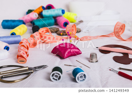 Sewing accessories for sewing and needlework on the table Sewing accessories for sewing and needlework on the table 141249349