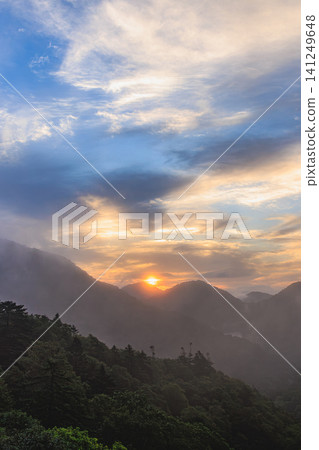 The silhouettes of the mountains against the silent dawn sky create a fantastical scene at Horohoro Pass. The silhouettes of the mountains against the silent dawn sky create a fantastical scene at Horohoro Pass. 141249648