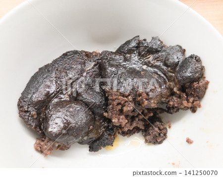 A traditional Hungarian blood sausage, Vérez Hurka, which was slightly imperfect in appearance due to a cooking error. A traditional Hungarian blood sausage, Vérez Hurka, which was slightly imperfect in appearance due to a cooking error. 141250070