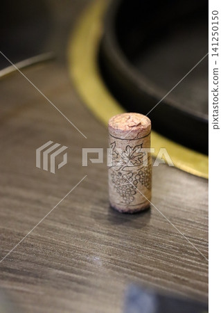 Wine Cork in Wooden Barrel Close-up Wine Cork in Wooden Barrel Close-up 141250150