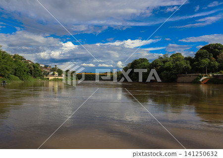 View of the Magdalena River as it passes through Girardot Cundinamarca and Flandes Tolima, taken from the Port of Los Guamos in Girardot. 141250632