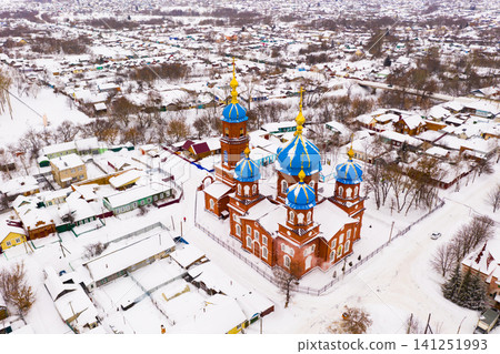 Aerial view of Church of the Intercession in winter in the city Petrovsk. Aerial view of Church of the Intercession in winter in the city Petrovsk. 141251993