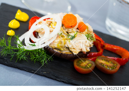 Chicken salad served on eggplant Chicken salad served on eggplant 141252147
