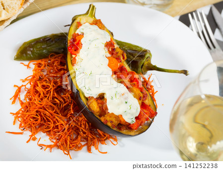 Baked eggplant with vegetable and tzatziki Baked eggplant with vegetable and tzatziki 141252238