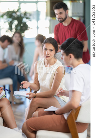 teams of students play a psychological game in the classroom with a teacher teams of students play a psychological game in the classroom with a teacher 141252552