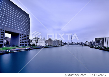 A long-exposure shot of Tokyo Skytree seen from Sumida River Bridge, over Kiyosu Bridge. A long-exposure shot of Tokyo Skytree seen from Sumida River Bridge, over Kiyosu Bridge. 141252657