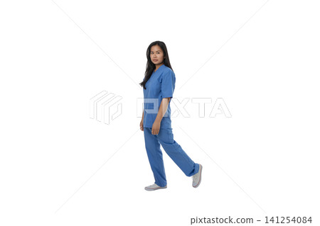 Doctor in scrubs prepares for patient care, isolated on white, PNG 141254084