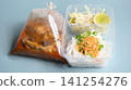 rice vermicelli with northern thai curry sauce in plastic bag 141254276