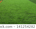 artificial green grass background for playground 141254282