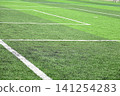 artificial green grass background for playground 141254283