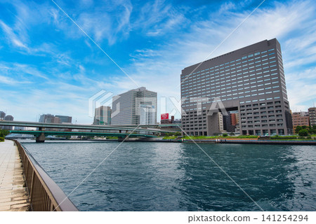 Sumida River Bridge and office buildings as seen from Sumida River Terrace Sumida River Bridge and office buildings as seen from Sumida River Terrace 141254294