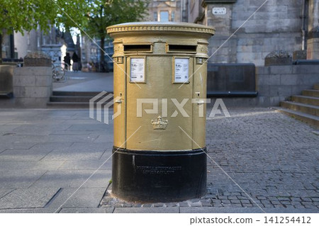 The golden mailbox in Hunter Square, Edinburgh The golden mailbox in Hunter Square, Edinburgh 141254412