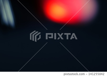 Soft bokeh glowing light effects with vibrant red, orange, and warm lens flare overlays Soft bokeh glowing light effects with vibrant red, orange, and warm lens flare overlays 141255842