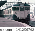 A close-up of the front of a Sobu Rapid Line 113 series 1000 series train stopped at Kinshicho Station during the JNR (Japanese National Railways) era. 141256792