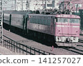 A passenger train pulled by an EF80 electric locomotive (No. 22) running near Nishi-Nippori Station during the Japanese National Railways era. 141257027