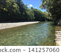 The Isuzu River flows through the western edge of the Inner Shrine of Ise Grand Shrine. 141257060