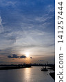 Sunset over the sea 141257444