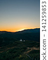A church standing on a plateau 141259853