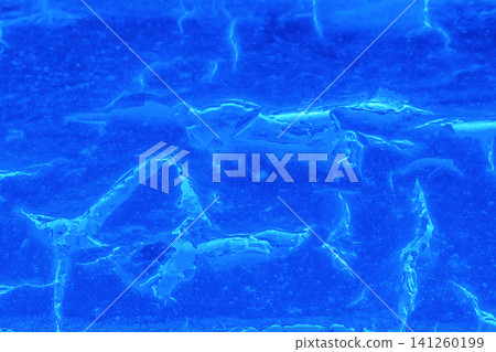Cracked blue navy cold color paint worn shabby old weathered surface texture abstract background pattern crack messy structure backdrop Cracked blue navy cold color paint worn shabby old weathered surface texture abstract background pattern crack messy structure backdrop 141260199