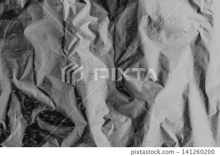 Foil crumpled texture wrinkled silver material abstract pattern surface background structure backdrop grey Foil crumpled texture wrinkled silver material abstract pattern surface background structure backdrop grey 141260200