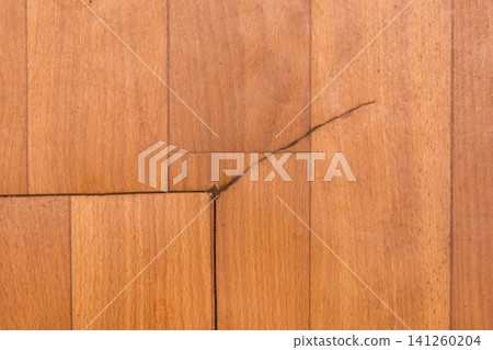 Broken torn linoleum old rubber polymer PVC floor damage material flooring repair brown object Broken torn linoleum old rubber polymer PVC floor damage material flooring repair brown object 141260204