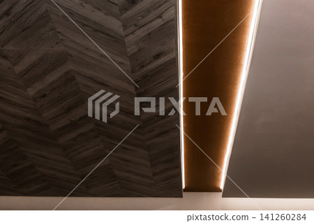 Modern renovation design and element of wooden ceiling with illumination of the interior of the room 141260284