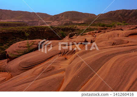 Wave Valley Danxia Landform in Jingbian, Yulin, Shaanxi, China Wave Valley Danxia Landform in Jingbian, Yulin, Shaanxi, China 141260416