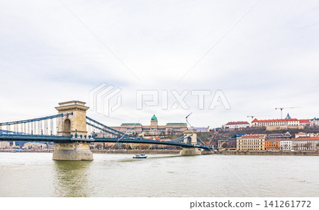 The view of the Széchenyi Chain Bridge and Buda Castle over the Danube River, a UNESCO World Heritage Site in Budapest, Hungary. The view of the Széchenyi Chain Bridge and Buda Castle over the Danube River, a UNESCO World Heritage Site in Budapest, Hungary. 141261772