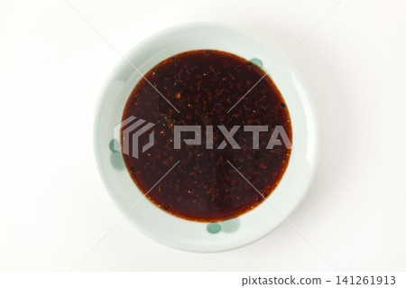 Worcestershire sauce and shichimi chili pepper Worcestershire sauce and shichimi chili pepper 141261913