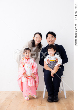 A family having their Shichi-Go-San photos taken. A family having their Shichi-Go-San photos taken. 141261986