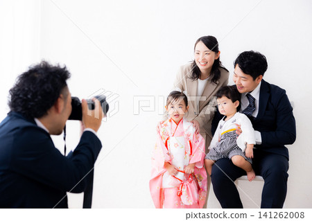 A family having their Shichi-Go-San photos taken. A family having their Shichi-Go-San photos taken. 141262008