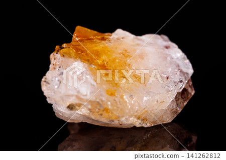 Macro mineral stone Citrine on black background Macro mineral stone Citrine on black background 141262812
