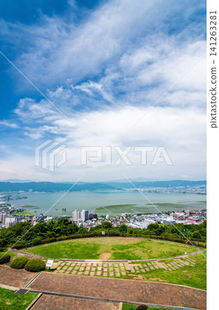 Stunning views of Lake Suwa and its surroundings from Tateishi Park during the summer season (Suwa City, Nagano Prefecture) Stunning views of Lake Suwa and its surroundings from Tateishi Park during the summer season (Suwa City, Nagano Prefecture) 141263281