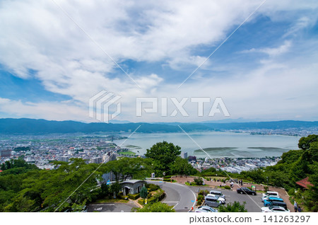 Stunning views of Lake Suwa and its surroundings from Tateishi Park during the summer season (Suwa City, Nagano Prefecture) Stunning views of Lake Suwa and its surroundings from Tateishi Park during the summer season (Suwa City, Nagano Prefecture) 141263297