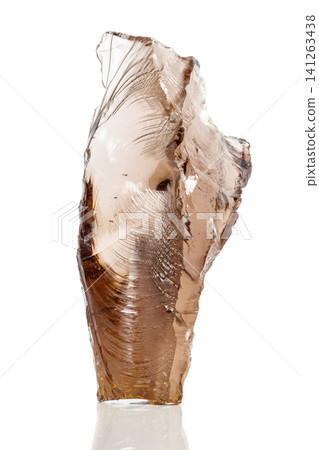 Macro mineral stone Smoky quartz, rauchtopaz on a white background Macro mineral stone Smoky quartz, rauchtopaz on a white background 141263438