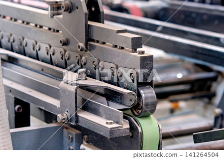 Heavy duty industrial chain drive conveyor mechanism in factory workshop Heavy duty industrial chain drive conveyor mechanism in factory workshop 141264504