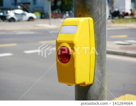 Pedestrian crossing push button on traffic signal pole in urban street. Pedestrian crossing push button on traffic signal pole in urban street. 141264664