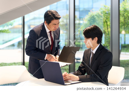 Asian businessman gets scolded by his boss Asian businessman gets scolded by his boss 141264934